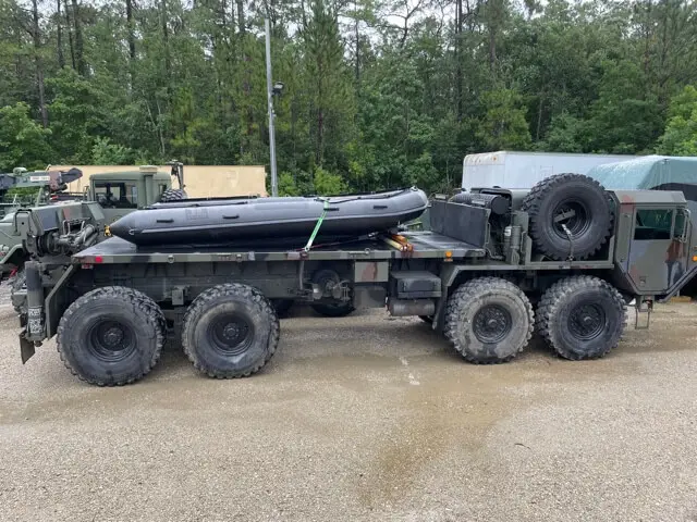 Eight-wheel truck carrying an inflatable boat